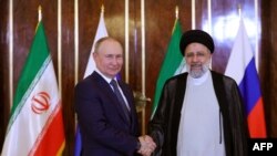Президенти Росії Володимир Путін (л) та Ірану Ебрагім Раїсі, архівне фото
