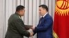 Президент Садыр Жапаров менен УКМК башчысы Камчыбек Ташиев. 
