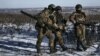 Українські військові на позиціях на передовій біля Соледару Донецької області, 11 січня 2023 року, ілюстративне фото