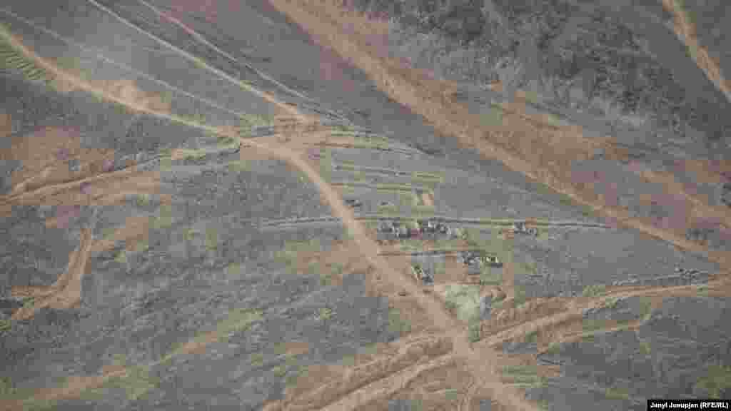 1. Helicopter view of now abandoned mining site, Chaunsky district, Chukotka, Russia 1. Helicopter view of now abandoned mining site in Chaunsky district in the north of Chukotka. During the WWII the Chaunsky district became the major source of tin and uranium for the Soviet war industry.