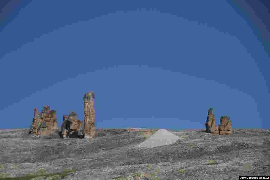 6. View of uranium mines, Chaunsky district, Chukotka, Russia 6. View of uranium mines under majestic Kekury – collection of column-like stone structures. Tens of thousands or more people may have died en route to the area or in the Kolyma's series of mining, road building, lumbering, and construction camps between 1932 and 1954.