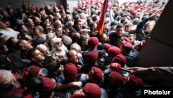 Armenia - Riot police clash with opposition supporters blocking the Foreign Ministry building in Yerevan, May 24, 2022.