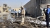 23 Killed In Iraq Suicide Attacks