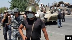 The police mission is intended to help restore order after massive clashes in Kyrgyzstan's south last month.