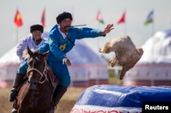 На чемпионате Азии по кокпару. Астана, 12 сентября 2013 года.