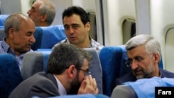 سعید جلیلی، مذاکره‌کننده ارشد هسته‌ای ایران (سمت راست، جلو).