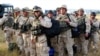 Iraqi Troops Take Over From Withdrawn Georgians