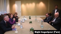 It's unclear whether the nuclear negotiators, led by Foreign Minister Mohammad Javad Zarif (right), actually received the alleged threats.