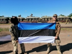 Микола Ілін із прапором Естонії