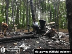 Уламки вертольота на місці падіння