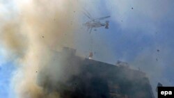 Yanğının söndürülməsində iki helikopter iştirak edib.