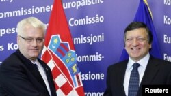 European Commission President Jose Manuel Barroso (right) and the EU are set to welcome President Ivo Josipovic's Croatia into the bloc as its 28th member. 