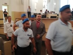 Віталія Марківа виводять із судового засідання в день вироку. Павія, 12 липня 2019 року