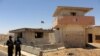 Dozens Of Afghan Security Personnel Reported Killed In Taliban Attacks