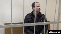 Ільдар Дадін, який став першим засудженим у Росії за статтею про порушення правил проведення мітингів, у суді, архівне фото 