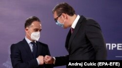 Српскиот претседател Александар Вучиќ и германскиот министер за надворешни работи Хajко Мас во Белград, 23 април 2021 година