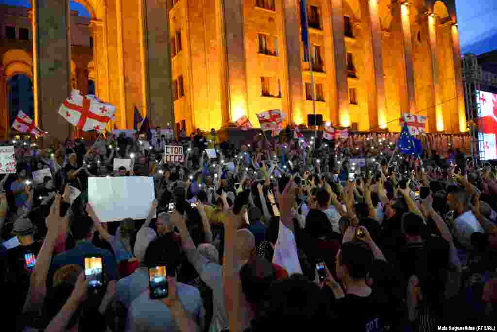 Protesters rally near the country's parliament in the capital, Tbilisi, on June 23.